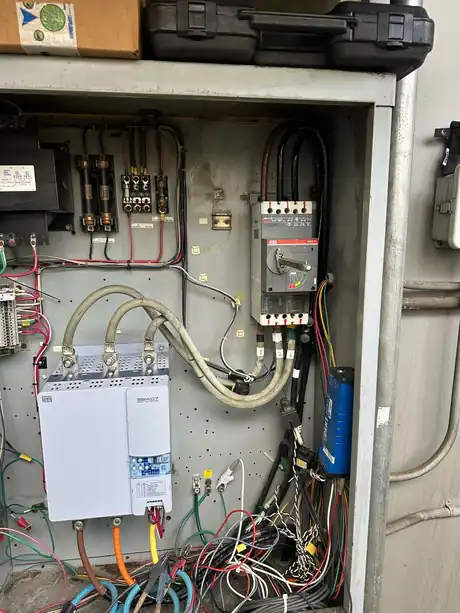 Compressor control panel mounted at a refrigeration skid